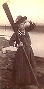 Old fashion photo of a woman with an oar