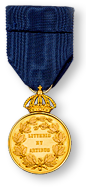 Foto av medaljen Litteris et Artibus i guld, med ett blått barn till.
