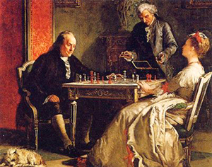 En man och en kvinna spelar schack, hon lutar sig tillbaka io sin stol, en tjänare står i bakgrunden
