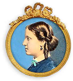 Colorerat porträttfoto av Isabel i profil i en guldram. Hon har örhänhen med kulor och en blå klänning med vit kant. Håret är uppsatt i en fin frisyr.