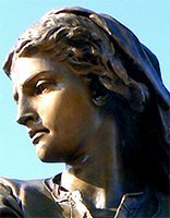 Foto av del av staty av Jeanne Hachette, endast huvudet syns